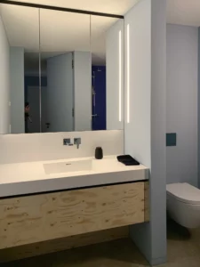 KLOCKE Badmoebel Corian Bausperrholz Architekturbuero (2)