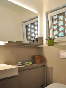 KLOCKE Gäste-WC Corianbecken Heizungsverkleidung